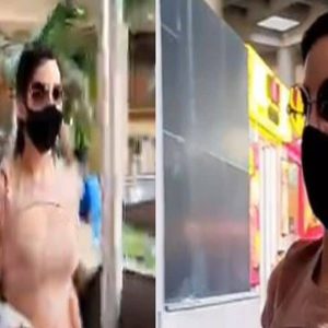 Every picture of Nora Fatehi trembles, just as it has gone viral on social media. Body parts of Nora Fatehi is shaking while she went outside of the airport video goes viral in social media. - News18 Bangla